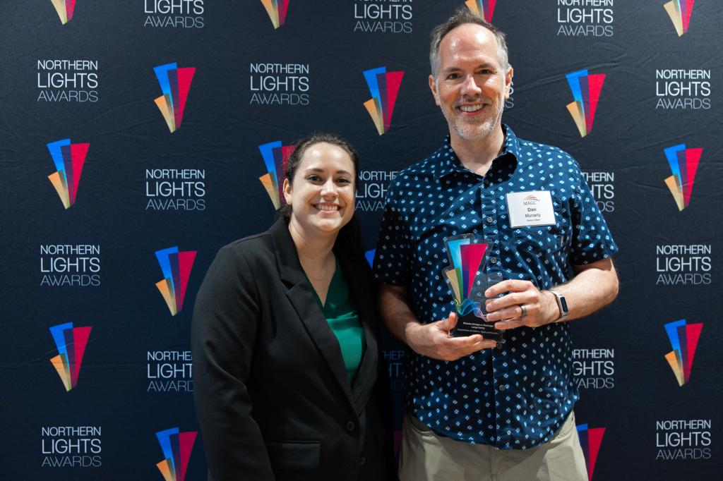 Dan accepting an award at ceremony